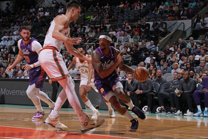 SAN ANTONIO, TX - MARCH 25: Bradley Beal #3 of the Phoenix Suns dribbles the ball during the game against the San Antonio Spurs on March 25, 2024 at the AT&T Center in San Antonio, Texas. NOTE TO USER: User expressly acknowledges and agrees that, by downloading and or using this photograph, user is consenting to the terms and conditions of the Getty Images License Agreement. Mandatory Copyright Notice: Copyright 2024 NBAE (Photos by Jesse D. Garrabrant/NBAE via Getty Images)