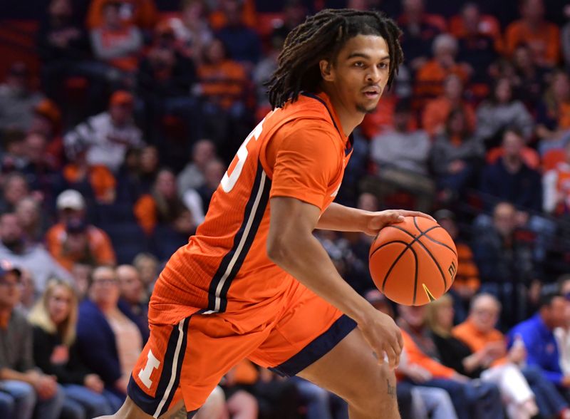 Nov 25, 2022; Champaign, Illinois, USA; Illinois Fighting Illini guard Skyy Clark (55) drives the ball up court during the first half against the Lindenwood Lions at State Farm Center. Mandatory Credit: Ron Johnson-USA TODAY Sports