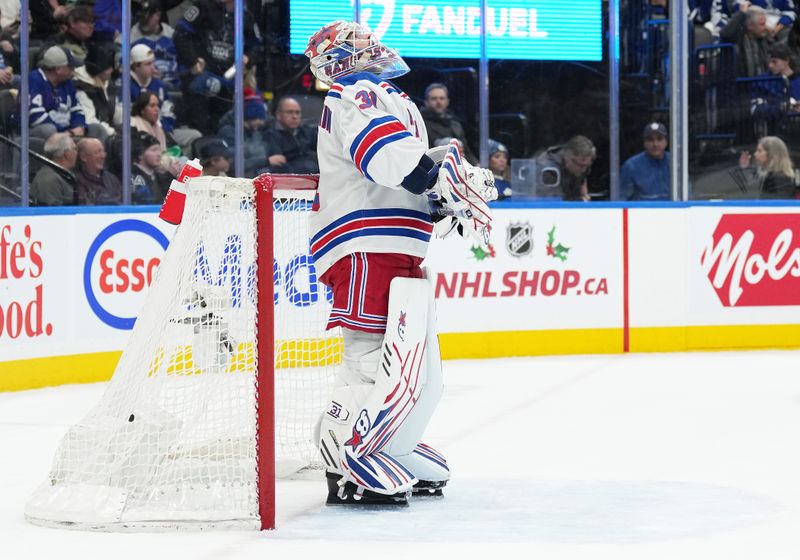 Dec 19, 2023; Toronto, Ontario, CAN; New York Rangers goaltender Igor Shesterkin (31) reacts against the Toronto Maple Leafs at the end of the third period at Scotiabank Arena. Mandatory Credit: Nick Turchiaro-USA TODAY Sports