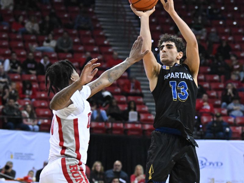Feb 14, 2023; Las Vegas, Nevada, USA; San Jose State Spartans guard Alvaro Cardenas (13) takes a shot against UNLV Runnin' Rebels guard Keshon Gilbert (10) in the second half at Thomas & Mack Center. Mandatory Credit: Candice Ward-USA TODAY Sports