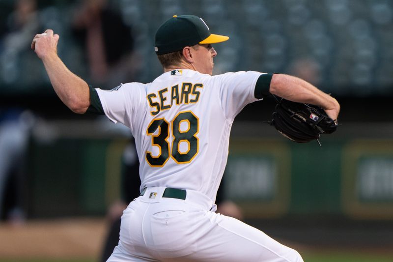 Sep 18, 2023; Oakland, California, USA;  Oakland Athletics starting pitcher JP Sears (38) pitches during the first inning against the Seattle Mariners at Oakland-Alameda County Coliseum. Mandatory Credit: Stan Szeto-USA TODAY Sports