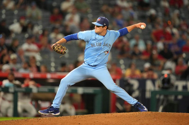 Aug 14, 2024; Anaheim, California, USA; Toronto Blue Jays relief pitcher Brendon Little (54) throws in the eighth inning against the Los Angeles Angels at Angel Stadium. Mandatory Credit: Kirby Lee-USA TODAY Sports