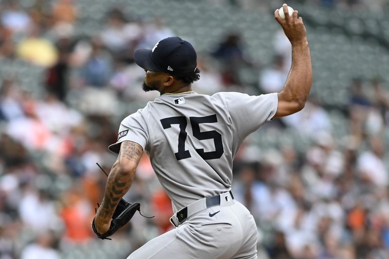 Sep 21, 2025; Baltimore, Maryland, USA; New York Yankees  pitcher Camilo Donal (75) throws a tenth inning pitch against the Baltimore Orioles  at Oriole Park at Camden Yards. Mandatory Credit: Tommy Gilligan-Imagn Images