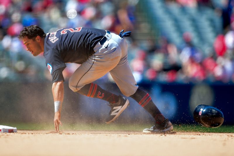 May 26, 2024; Anaheim, California, USA; Cleveland Guardians outfielder Tyler Freeman (2) steals second against the Los Angeles Angels during the eighth inning at Angel Stadium. Mandatory Credit: Gary A. Vasquez-USA TODAY Sports