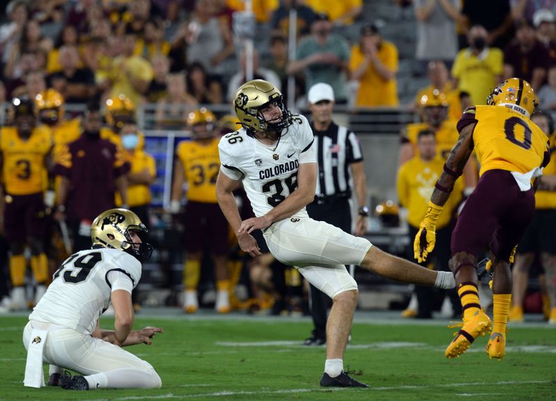 Sep 25, 2021; Tempe, Arizona, USA; Colorado Buffaloes place kicker Cole Becker (36) has his field goal attempt blocked by Arizona State Sun Devils defensive back Jack Jones (0) during the first half at Sun Devil Stadium. Mandatory Credit: Joe Camporeale-USA TODAY Sports