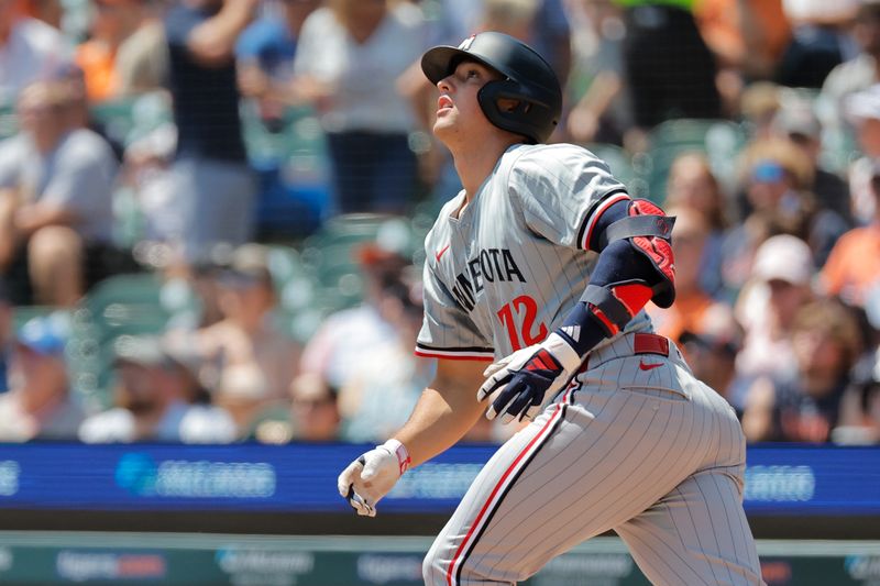 Jul 28, 2024; Detroit, Michigan, USA;  Minnesota Twins third baseman Brooks Lee (72) hits a sacrifice fly to score a run in the second inning against the Detroit Tigers at Comerica Park. Mandatory Credit: Rick Osentoski-USA TODAY Sports