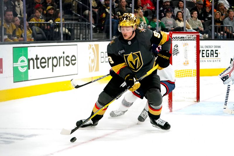 Mar 19, 2023; Las Vegas, Nevada, USA; Vegas Golden Knights center Jack Eichel (9) skates with the puck during the second period against the Columbus Blue Jackets at T-Mobile Arena. Mandatory Credit: Lucas Peltier-USA TODAY Sports