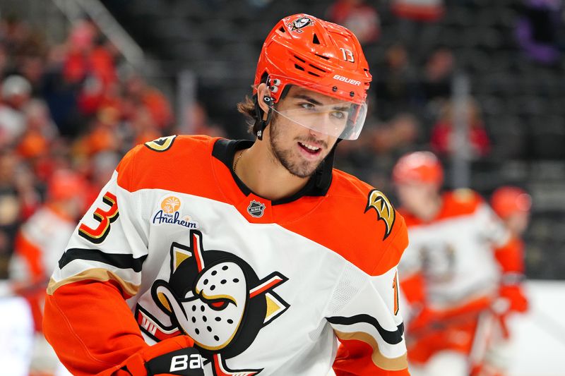 Nov 8, 2025; Las Vegas, Nevada, USA; Anaheim Ducks center Nikita Nesterenko (13) warms up before a game against the Vegas Golden Knights at T-Mobile Arena. Mandatory Credit: Stephen R. Sylvanie-Imagn Images