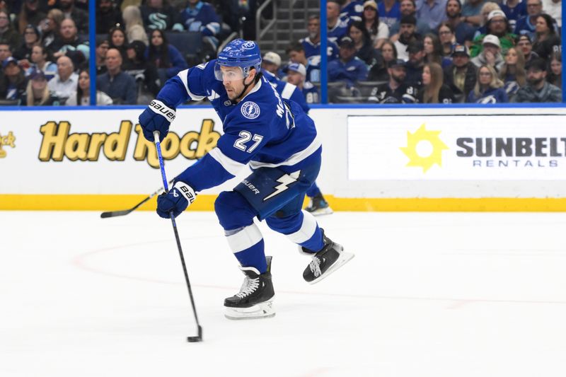 Mar 26, 2026; Tampa, Florida, USA; Tampa Bay Lightning Ryan McDonagh (27) makes a pass during a game against Seattle Kraken at Benchmark International Arena. Mandatory Credit: Pablo Robles-Imagn Images