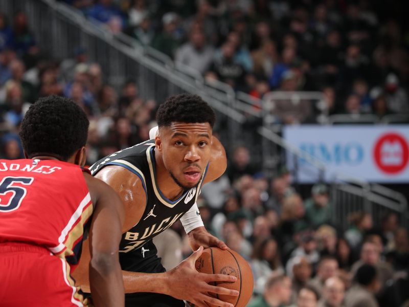 MILWAUKEE, WI - JANUARY 27:  Giannis Antetokounmpo #34 of the Milwaukee Bucks handles the ball during the game on January 27, 2024 at the Fiserv Forum Center in Milwaukee, Wisconsin. NOTE TO USER: User expressly acknowledges and agrees that, by downloading and or using this Photograph, user is consenting to the terms and conditions of the Getty Images License Agreement. Mandatory Copyright Notice: Copyright 2024 NBAE (Photo by Gary Dineen/NBAE via Getty Images).