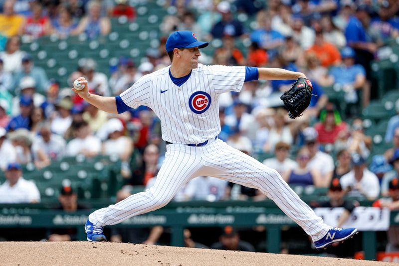 Jun 19, 2024; Chicago, Illinois, USA; Chicago Cubs starting pitcher Kyle Hendricks (28) delivers a pitch against the San Francisco Giants during the first inning at Wrigley Field. Mandatory Credit: Kamil Krzaczynski-USA TODAY Sports