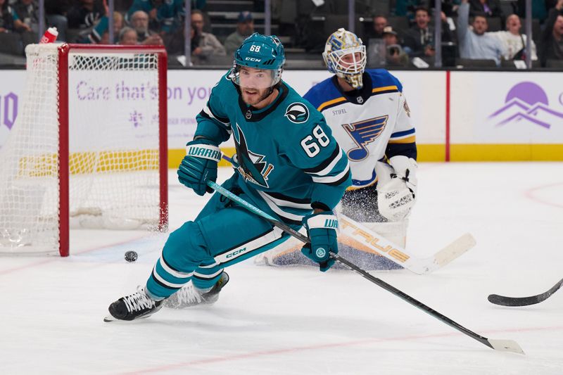 Nov 16, 2023; San Jose, California, USA; San Jose Sharks left wing Mike Hoffman (68) reacts after scoring a goal against St. Louis Blues goaltender Jordan Binnington (50) during the second period at SAP Center at San Jose. Mandatory Credit: Robert Edwards-USA TODAY Sports