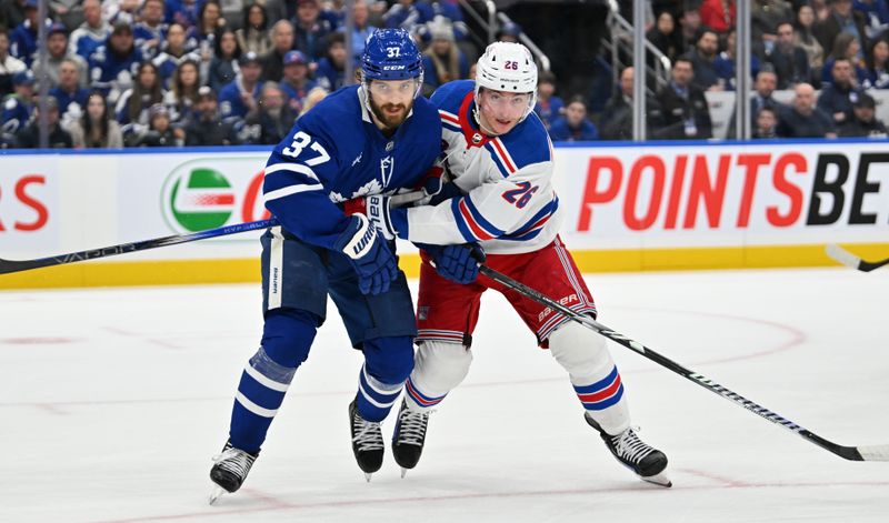 Mar 2, 2024; Toronto, Ontario, CAN;  Toronto Maple Leafs defenseman Timothy Lilgren (37) covers New York Rangers forward Jimmy Vesey (26) in the second period at Scotiabank Arena. Mandatory Credit: Dan Hamilton-USA TODAY Sports