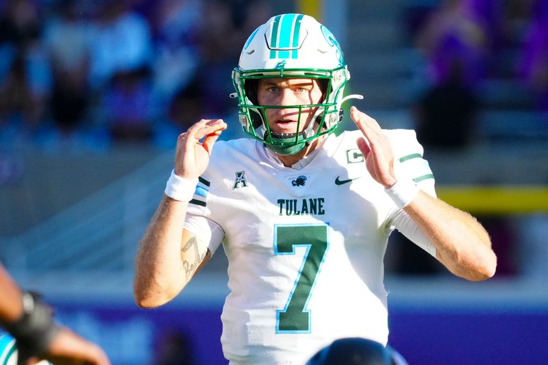 Nov 4, 2023; Greenville, North Carolina, USA;  Tulane Green Wave quarterback Michael Pratt (7) looks on against the East Carolina Pirates during the first half at Dowdy-Ficklen Stadium. Mandatory Credit: James Guillory-USA TODAY Sports