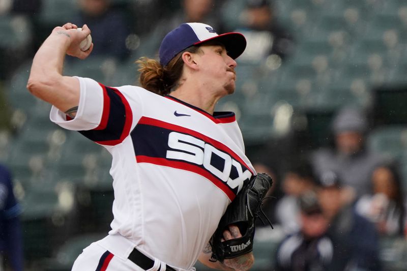 Apr 30, 2023; Chicago, Illinois, USA; Chicago White Sox starting pitcher Mike Clevinger (52) throws a pitch against the Tampa Bay Rays during the first inning at Guaranteed Rate Field. Mandatory Credit: David Banks-USA TODAY Sports