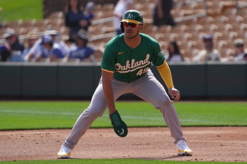 Feb 25, 2024; Phoenix, Arizona, USA; Oakland Athletics first baseman Ryan Noda (49) leads off first base against the Los Angeles Dodgers during the first inning at Camelback Ranch-Glendale. Mandatory Credit: Joe Camporeale-USA TODAY Sports