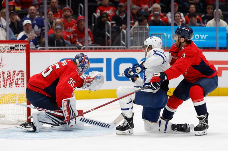 Oct 24, 2023; Washington, District of Columbia, USA; Toronto Maple Leafs right wing William Nylander (88) scores a goal on Washington Capitals goaltender Darcy Kuemper (35) as Capitals defenseman Nick Jensen (3) defends in the second period at Capital One Arena. Mandatory Credit: Geoff Burke-USA TODAY Sports