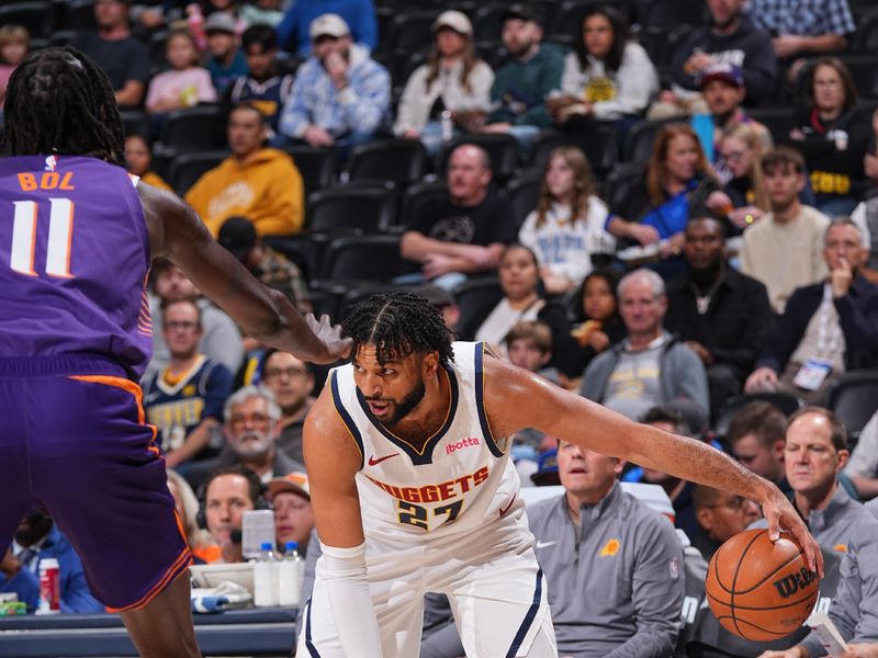 DENVER, CO - OCTOBER 13: Jamal Murray #27 of the Denver Nuggets dribbles the ball during the game against the Phoenix Suns on October 13, 2024 at Ball Arena in Denver, Colorado. NOTE TO USER: User expressly acknowledges and agrees that, by downloading and/or using this Photograph, user is consenting to the terms and conditions of the Getty Images License Agreement. Mandatory Copyright Notice: Copyright 2024 NBAE (Photo by Bart Young/NBAE via Getty Images)