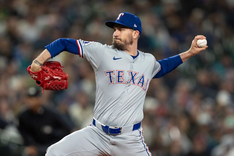 Jun 14, 2024; Seattle, Washington, USA; Texas Rangers starter Andrew Heaney (44) delivers a pitch during the third inning against the Seattle Mariners at T-Mobile Park. Mandatory Credit: Stephen Brashear-USA TODAY Sports