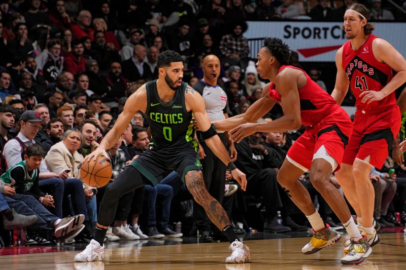 TORONTO, CANADA - JANUARY 15: Jayson Tatum #0 of the Boston Celtics dribbles the ball during the game against the Toronto Raptors on January 15, 2025 at the Scotiabank Arena in Toronto, Ontario, Canada.  NOTE TO USER: User expressly acknowledges and agrees that, by downloading and or using this Photograph, user is consenting to the terms and conditions of the Getty Images License Agreement.  Mandatory Copyright Notice: Copyright 2025 NBAE (Photo by Mark Blinch/NBAE via Getty Images)