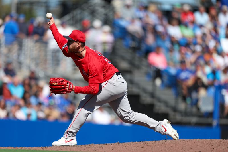 Mar 6, 2025; Dunedin, Florida, USA; Boston Red Sox pitcher Zack Kelly (76) throws a pitch against the Toronto Blue Jays in the fourth inning during spring training at TD Ballpark. Mandatory Credit: Nathan Ray Seebeck-Imagn Images