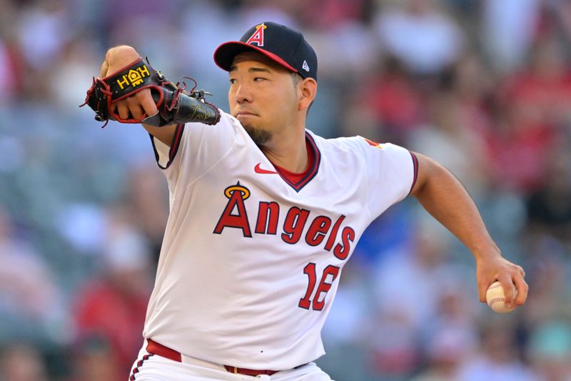 Jul 12, 2025; Anaheim, California, USA;  Los Angeles Angels starting pitcher Yusei Kikuchi (16) delivers to the plate during the first inning against the Arizona Diamondbacks at Angel Stadium. Mandatory Credit: Jayne Kamin-Oncea-Imagn Images