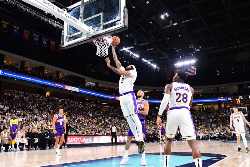 LOS ANGELES, CA - OCTOBER 6: Anthony Davis #3 of the Los Angeles Lakers drives to the basket during the game against the Phoenix Suns on October 6, 2024 at Acrisure Arena in Palm Springs, California. NOTE TO USER: User expressly acknowledges and agrees that, by downloading and/or using this Photograph, user is consenting to the terms and conditions of the Getty Images License Agreement. Mandatory Copyright Notice: Copyright 2024 NBAE (Photo by Adam Pantozzi/NBAE via Getty Images)