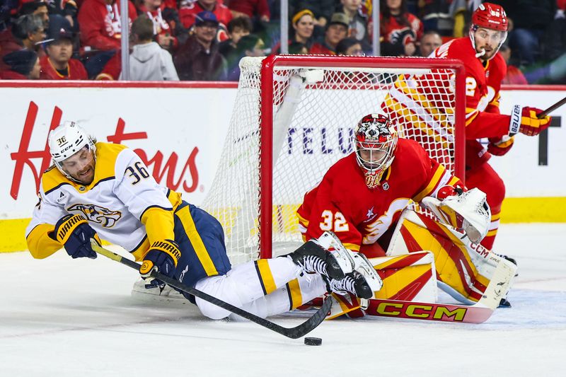 Nov 15, 2024; Calgary, Alberta, CAN; Nashville Predators left wing Cole Smith (36) controls the puck in front of Calgary Flames goaltender Dustin Wolf (32) during the third period at Scotiabank Saddledome. Mandatory Credit: Sergei Belski-Imagn Images