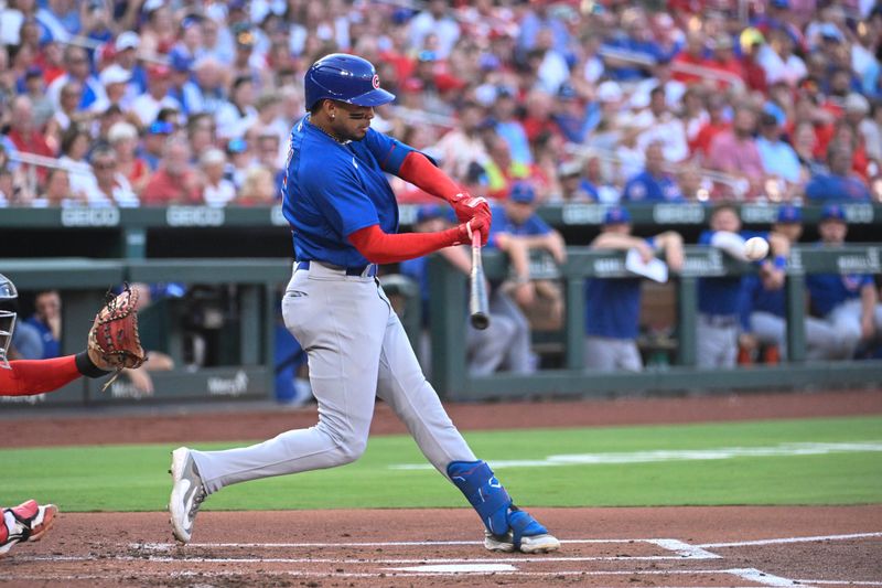 Jul 27, 2023; St. Louis, Missouri, USA; Chicago Cubs designated hitter Christopher Morel (5) hits a two-run ground-rule double against the St. Louis Cardinals in the first inning at Busch Stadium. Mandatory Credit: Joe Puetz-USA TODAY Sports