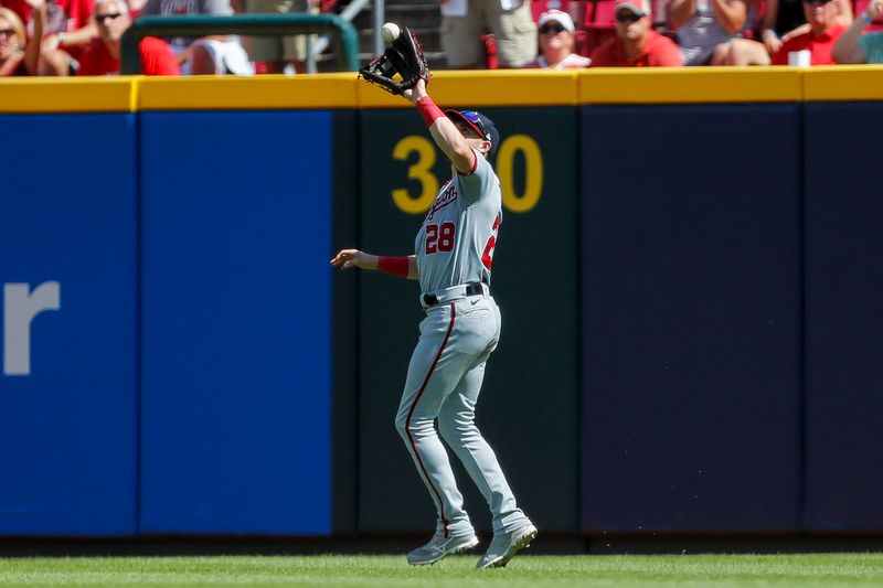 Aug 6, 2023; Cincinnati, Ohio, USA; Washington Nationals right fielder Lane Thomas (28) catches a pop up hit by Cincinnati Reds shortstop Elly De La Cruz (not pictured) in the seventh inning at Great American Ball Park. Mandatory Credit: Katie Stratman-USA TODAY Sports