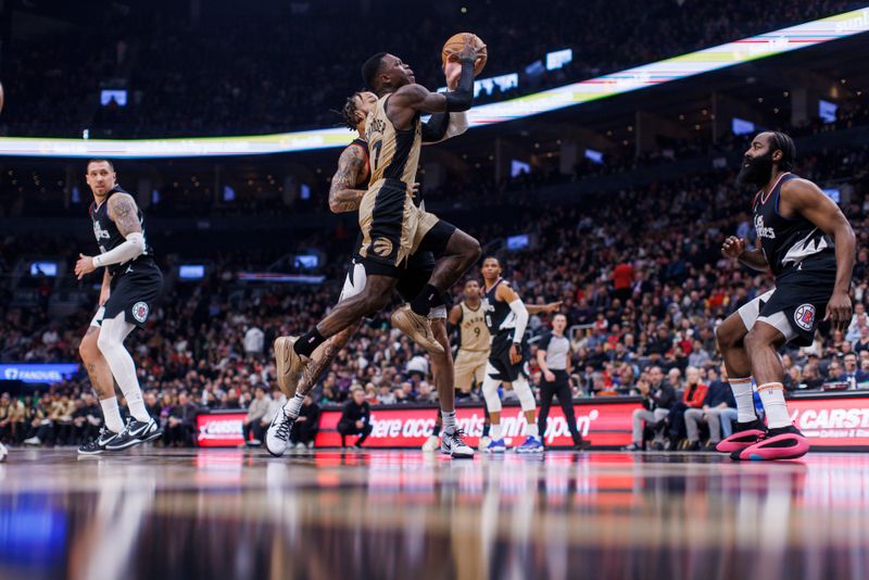 TORONTO, CANADA - JANUARY 26: Dennis Schroder #17 of the Toronto Raptors drives to the net against the LA Clippers during the first half of their NBA game at Scotiabank Arena on January 26, 2024 in Toronto, Canada. NOTE TO USER: User expressly acknowledges and agrees that, by downloading and or using this photograph, User is consenting to the terms and conditions of the Getty Images License Agreement. (Photo by Cole Burston/Getty Images)