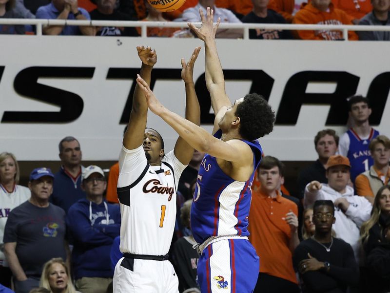 Feb 14, 2023; Stillwater, Oklahoma, USA; Oklahoma State Cowboys guard Bryce Thompson (1) shoots as Kansas Jayhawks guard Kevin McCullar Jr. (15) defends the shot during the first half at Gallagher-Iba Arena. Mandatory Credit: Alonzo Adams-USA TODAY Sports