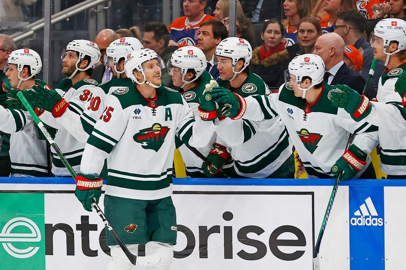 Feb 23, 2024; Edmonton, Alberta, CAN; The Minnesota Wild celebrate a goal scored by defensemen Jonas Brodin (25) during the third period against the Edmonton Oilers at Rogers Place. Mandatory Credit: Perry Nelson-USA TODAY Sports