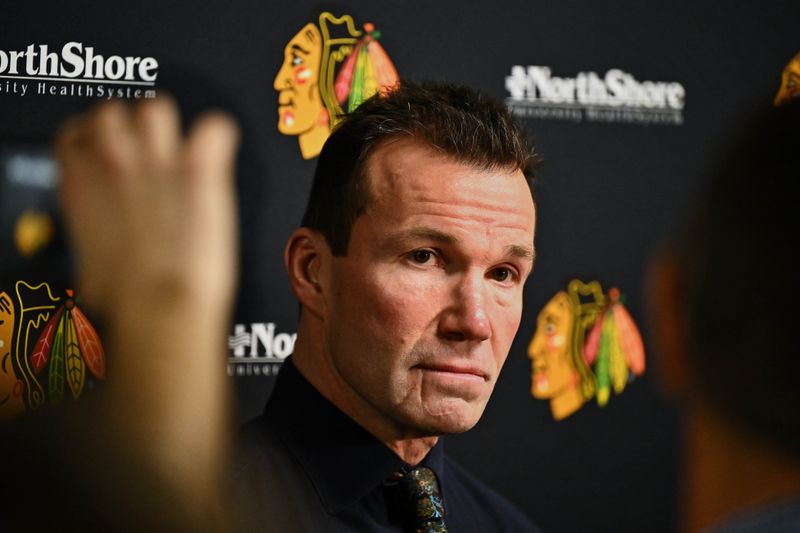 Jan 19, 2024; Chicago, Illinois, USA; Chicago Blackhawks head coach Luke Richardson meets with the media before a game against the New York Islanders at United Center. Mandatory Credit: Jamie Sabau-USA TODAY Sports