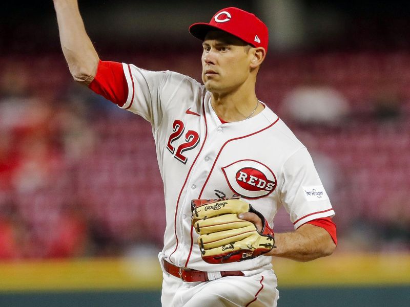 Apr 18, 2023; Cincinnati, Ohio, USA; Cincinnati Reds catcher Luke Maile (22) pitches against the Tampa Bay Rays in the ninth inning at Great American Ball Park. Mandatory Credit: Katie Stratman-USA TODAY Sports