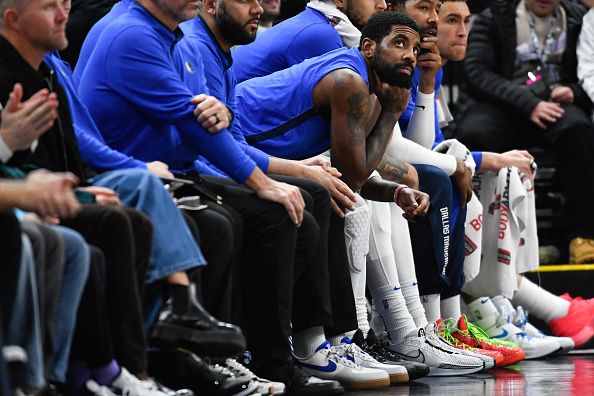 SALT LAKE CITY, UTAH - JANUARY 01: Kyrie Irving #11 of the Dallas Mavericks looks on from the bench during the second half of a game against the Utah Jazz at Delta Center on January 01, 2024 in Salt Lake City, Utah. NOTE TO USER: User expressly acknowledges and agrees that, by downloading and or using this photograph, User is consenting to the terms and conditions of the Getty Images License Agreement. (Photo by Alex Goodlett/Getty Images)