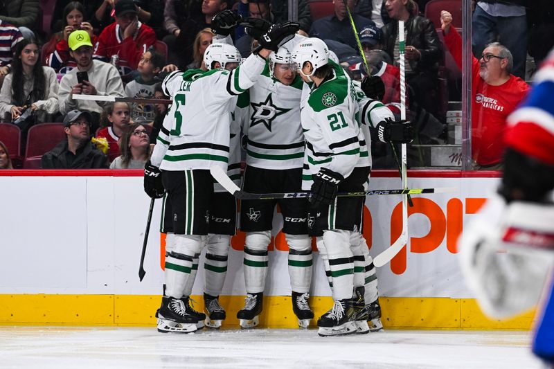 Oct 22, 2022; Montreal, Quebec, CAN; Dallas Stars center Joe Pavelski (16) celebrates with teammates after scoring his second goal of the game against the Montreal Canadiens during the second period at Bell Centre. Mandatory Credit: David Kirouac-USA TODAY Sports