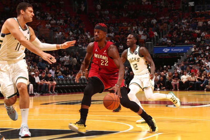 MIAMI, FL - NOVEMBER 26: Jimmy Butler #22 of the Miami Heat handles the ball during the game against the Milwaukee Bucks during the Emirates NBA Cup game on November 26, 2024 at Kaseya Center in Miami, Florida. NOTE TO USER: User expressly acknowledges and agrees that, by downloading and or using this Photograph, user is consenting to the terms and conditions of the Getty Images License Agreement. Mandatory Copyright Notice: Copyright 2024 NBAE (Photo by Issac Baldizon/NBAE via Getty Images)