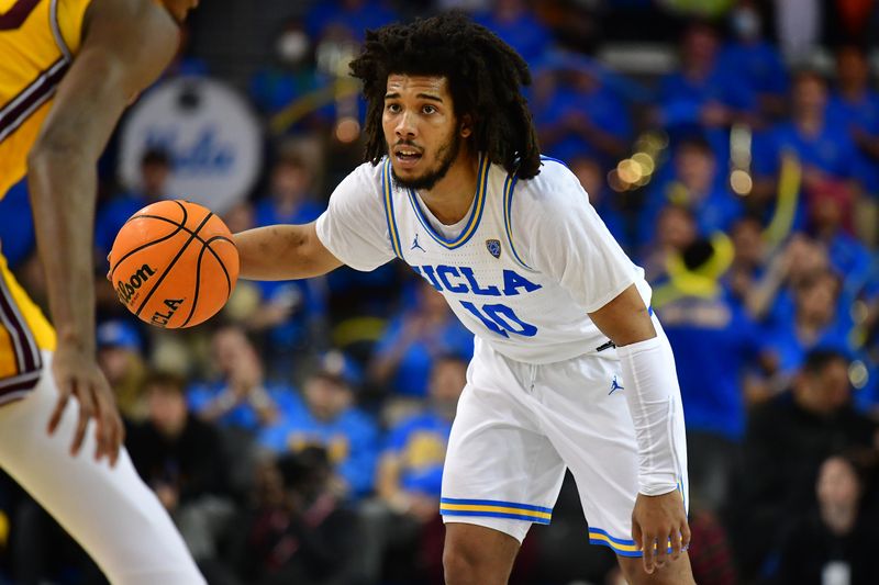 Mar 2, 2023; Los Angeles, California, USA; UCLA Bruins guard Tyger Campbell (10) controls the ball against the Arizona State Sun Devils during the second half at Pauley Pavilion. Mandatory Credit: Gary A. Vasquez-USA TODAY Sports