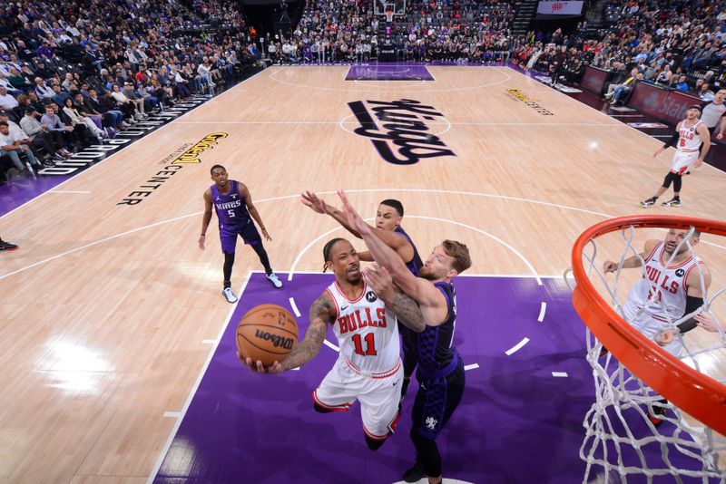 SACRAMENTO, CA - MARCH 4: DeMar DeRozan #11 of the Chicago Bulls drives to the basket during the game against the Sacramento Kings on March 4, 2024 at Golden 1 Center in Sacramento, California. NOTE TO USER: User expressly acknowledges and agrees that, by downloading and or using this Photograph, user is consenting to the terms and conditions of the Getty Images License Agreement. Mandatory Copyright Notice: Copyright 2024 NBAE (Photo by Rocky Widner/NBAE via Getty Images)