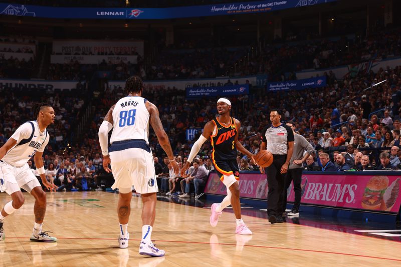 OKLAHOMA CITY, OK - APRIL 14:  Shai Gilgeous-Alexander #2 of the Oklahoma City Thunder dribbles the ball during the game against the Dallas Mavericks on April 14, 2024 at Paycom Arena in Oklahoma City, Oklahoma. NOTE TO USER: User expressly acknowledges and agrees that, by downloading and or using this photograph, User is consenting to the terms and conditions of the Getty Images License Agreement. Mandatory Copyright Notice: Copyright 2024 NBAE (Photo by Zach Beeker/NBAE via Getty Images)