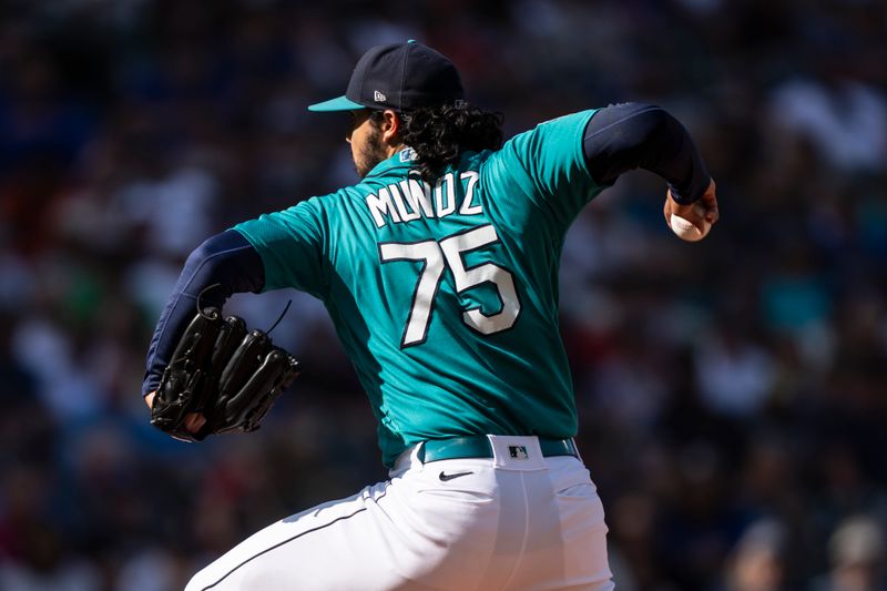 Sep 13, 2023; Seattle, Washington, USA; Seattle Mariners reliever Andres Munoz (75) delivers a pitch during the ninth inning against the Los Angeles Angels at T-Mobile Park. Mandatory Credit: Stephen Brashear-USA TODAY Sports