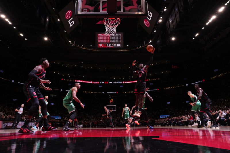 TORONTO, CANADA - JANUARY 15:  Dennis Schroder #17 of the Toronto Raptors rebounds the ball during the game against the Boston Celtics on January 15, 2024 at the Scotiabank Arena in Toronto, Ontario, Canada.  NOTE TO USER: User expressly acknowledges and agrees that, by downloading and or using this Photograph, user is consenting to the terms and conditions of the Getty Images License Agreement.  Mandatory Copyright Notice: Copyright 2024 NBAE (Photo by Mark Blinch/NBAE via Getty Images)