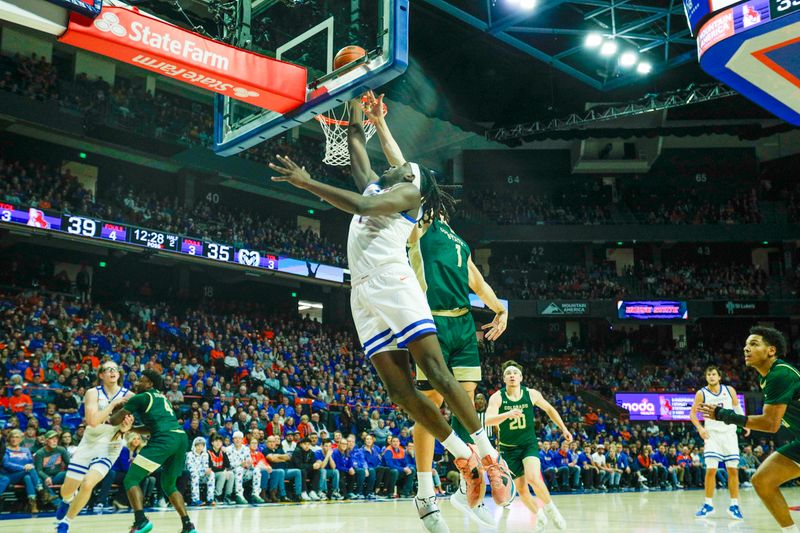 Jan 9, 2024; Boise, Idaho, USA; Boise State Broncos forward O'Mar Stanley (1) attempts to rebound during the second half against the Colorado State Rams at ExtraMile Arena. Mandatory Credit: Brian Losness-USA TODAY Sports
