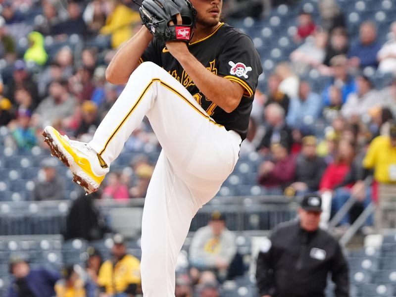 May 4, 2024; Pittsburgh, Pennsylvania, USA;  Pittsburgh Pirates pitcher Jared Jones (37) delivers a pitch against the Colorado Rockies during the first inning at PNC Park. Mandatory Credit: Gregory Fisher-USA TODAY Sports