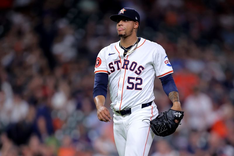 Apr 30, 2024; Houston, Texas, USA; Houston Astros relief pitcher Bryan Abreu (52) reacts after a strikeout against the Cleveland Guardians during the seventh inning at Minute Maid Park. Mandatory Credit: Erik Williams-USA TODAY Sports