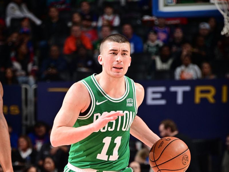 DETROIT, MI - MARCH 22: Payton Pritchard #11 of the Boston Celtics dribbles the ball during the game against the Detroit Pistons on March 22, 2024 at Little Caesars Arena in Detroit, Michigan. NOTE TO USER: User expressly acknowledges and agrees that, by downloading and/or using this photograph, User is consenting to the terms and conditions of the Getty Images License Agreement. Mandatory Copyright Notice: Copyright 2024 NBAE (Photo by Chris Schwegler/NBAE via Getty Images)