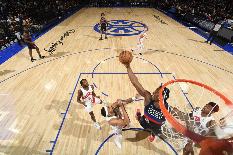 DETROIT, MI - MARCH 13: Jalen Duren #0 of the Detroit Pistons rebounds the ball during the game against the Toronto Raptors on March 13, 2024 at Little Caesars Arena in Detroit, Michigan. NOTE TO USER: User expressly acknowledges and agrees that, by downloading and/or using this photograph, User is consenting to the terms and conditions of the Getty Images License Agreement. Mandatory Copyright Notice: Copyright 2024 NBAE (Photo by Chris Schwegler/NBAE via Getty Images)