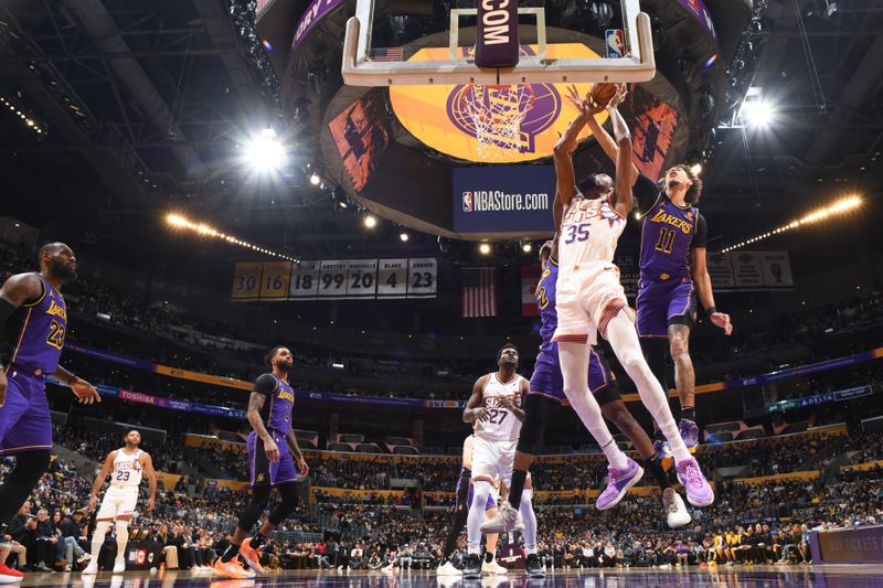 LOS ANGELES, CA - JANUARY 11: Kevin Durant #35 of the Phoenix Suns drives to the basket during the game against the Los Angeles Lakers on January 11, 2024 at Crypto.Com Arena in Los Angeles, California. NOTE TO USER: User expressly acknowledges and agrees that, by downloading and/or using this Photograph, user is consenting to the terms and conditions of the Getty Images License Agreement. Mandatory Copyright Notice: Copyright 2024 NBAE (Photo by Andrew D. Bernstein/NBAE via Getty Images)