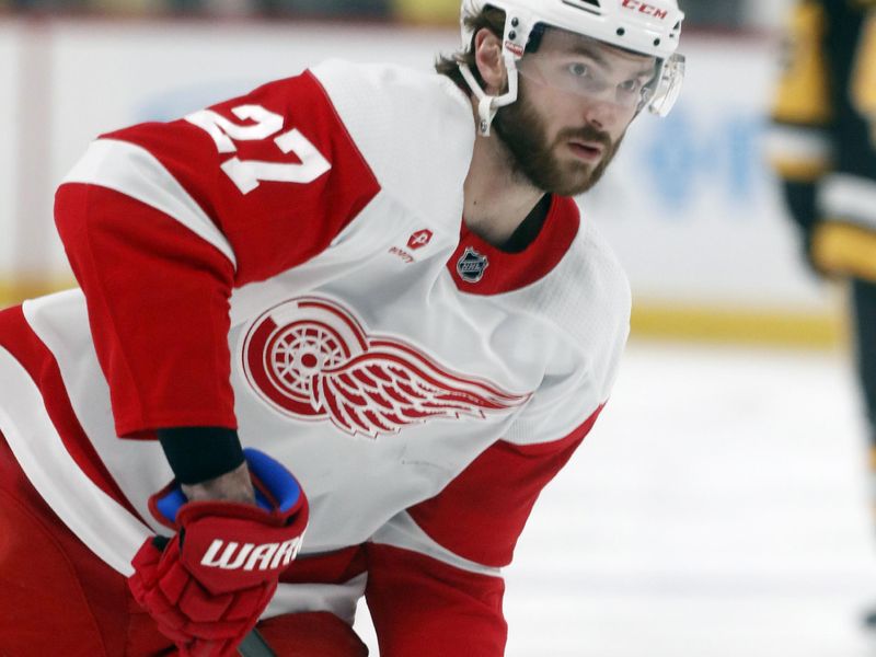 Mar 17, 2024; Pittsburgh, Pennsylvania, USA;  Detroit Red Wings center Michael Rasmussen (27) warms up before the game against the Pittsburgh Penguins at PPG Paints Arena. Mandatory Credit: Charles LeClaire-USA TODAY Sports